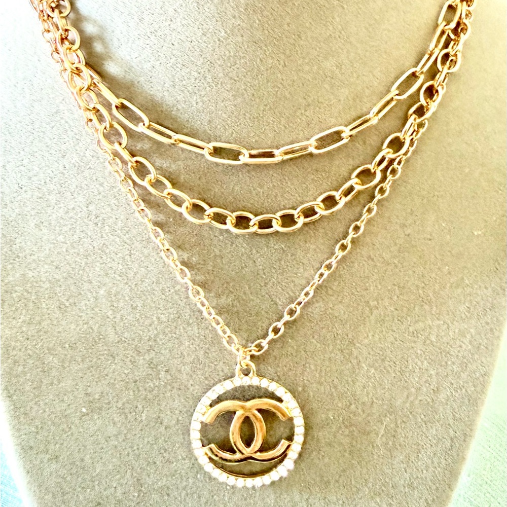 Layered Gold-Tone Pendant Necklace with Interlocking Logo Accent